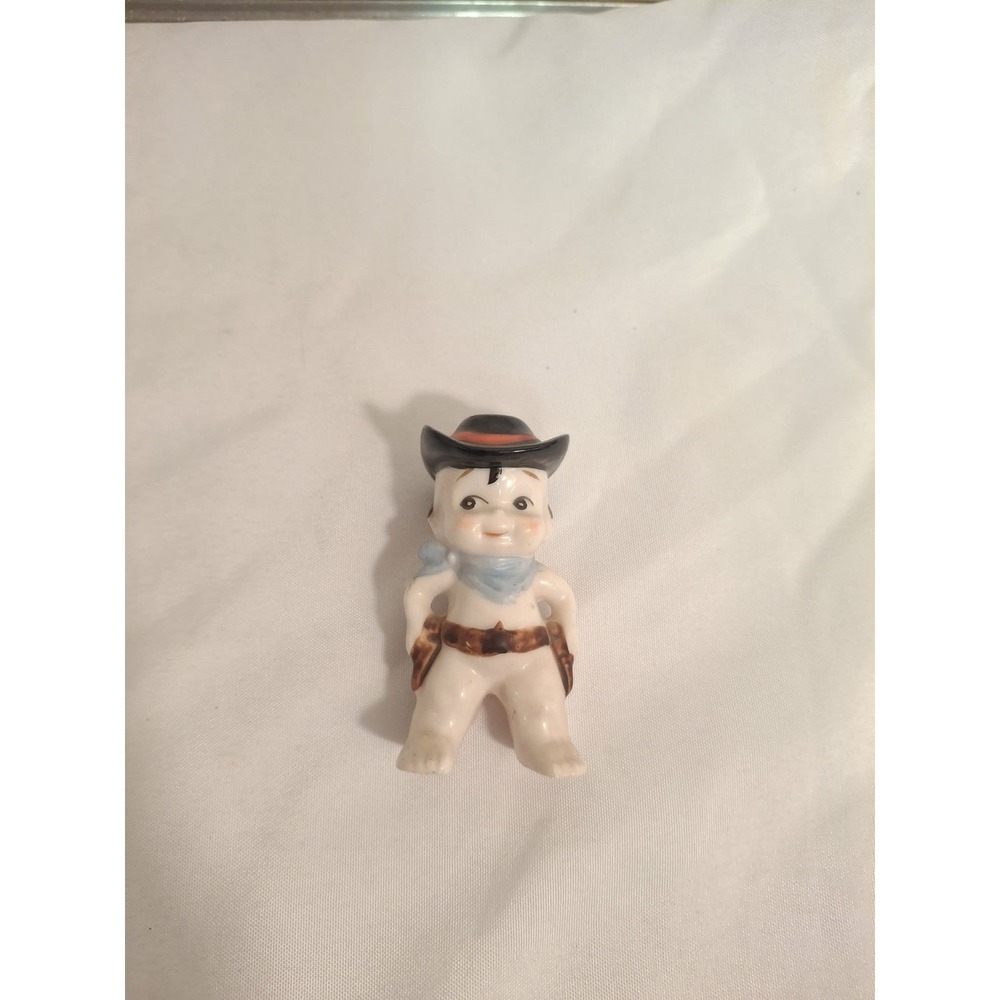 BABY COWBOY CERAMIC FIGURINE VINTAGE HANDPAINTED DRAWING GUN SOUTHWESTERN DECOR